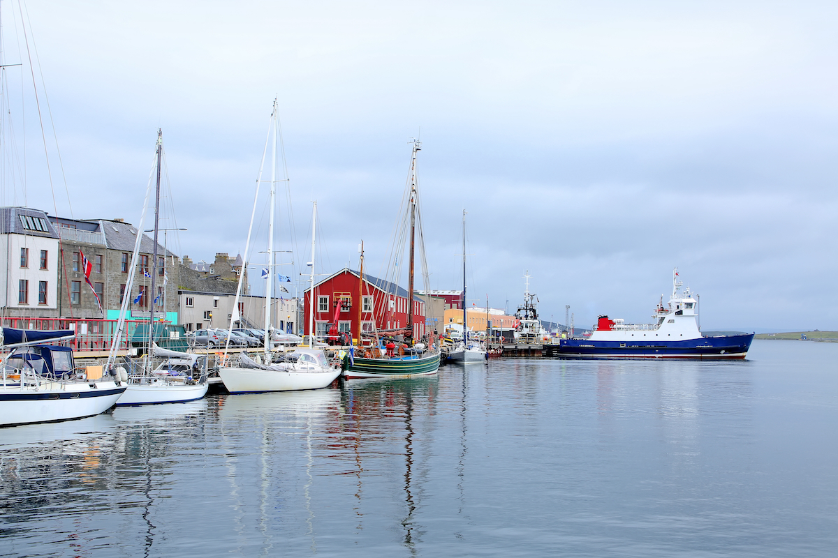 Lerwick harbour Shetland with fishing boats AdobeStock 356119634