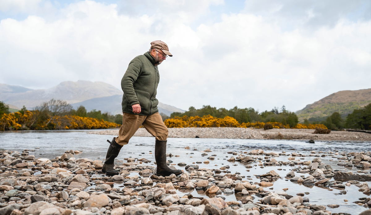 Scientist Bob Kindness MBE inspects gravel movement on the River Carron from winter spates sudden flood events that can wash out salmon redds (egg nests) and damage spawning habitat