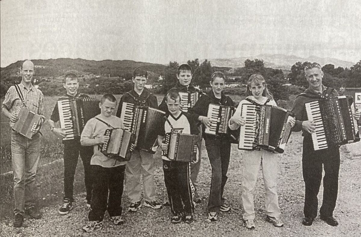 2001: Tutors Ronnie Douglas and Malcolm Munro with their piano and button box pupils at the 11th Feis nan Garbh Chriochan at Acharacle School and Shielbridge Hall which reached its climax with a grand concert and dance. More than 80 youngsters from nine to 18 took part.