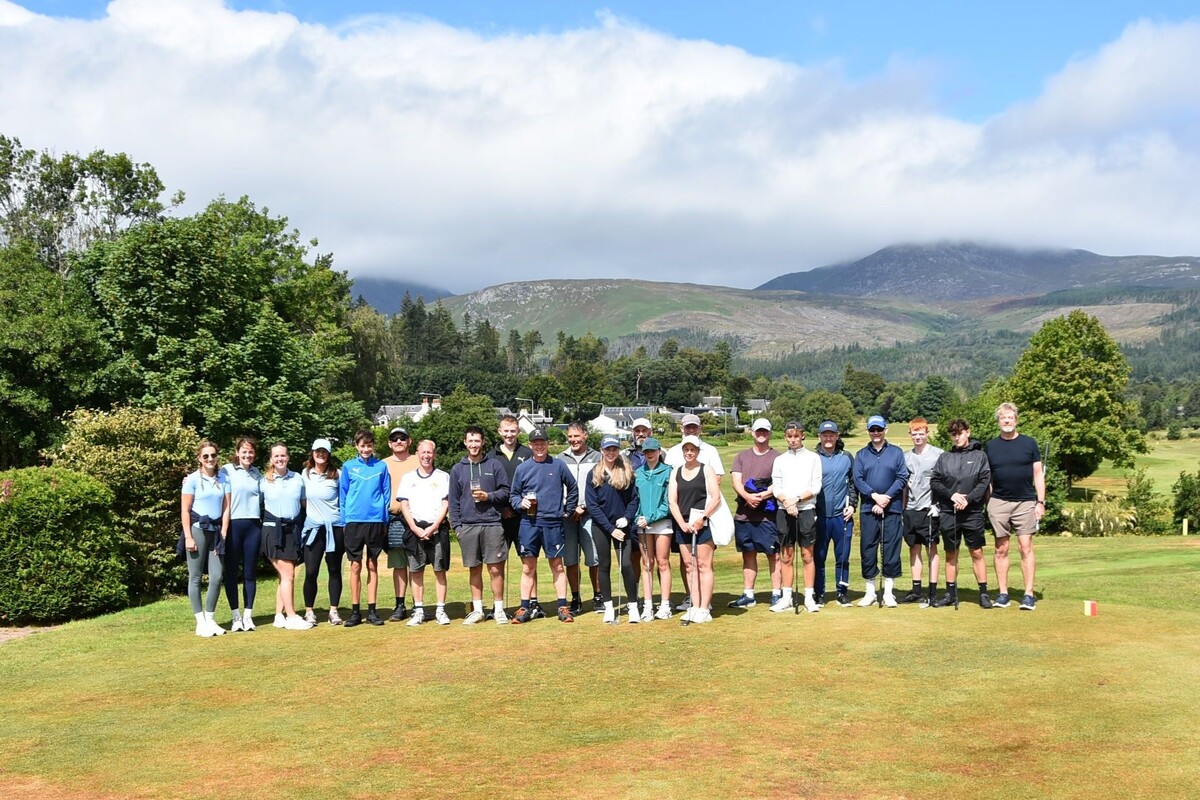 All of the teams from the first group of golfers gathered at Brodick Golf Club during the Three-Sport Challenge.