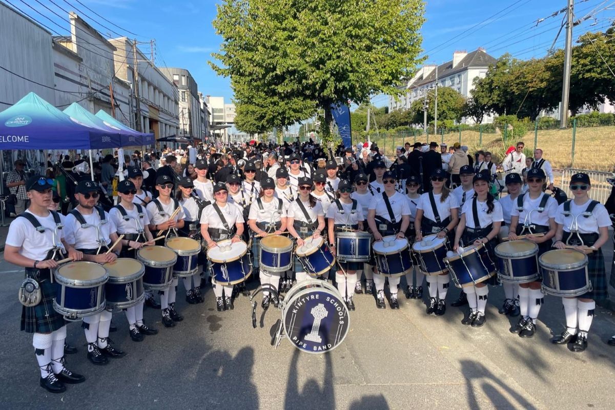 Kintyre Schools Pipe Band sport their warm weather gear at the Festival Interceltique in Lorient, western France.