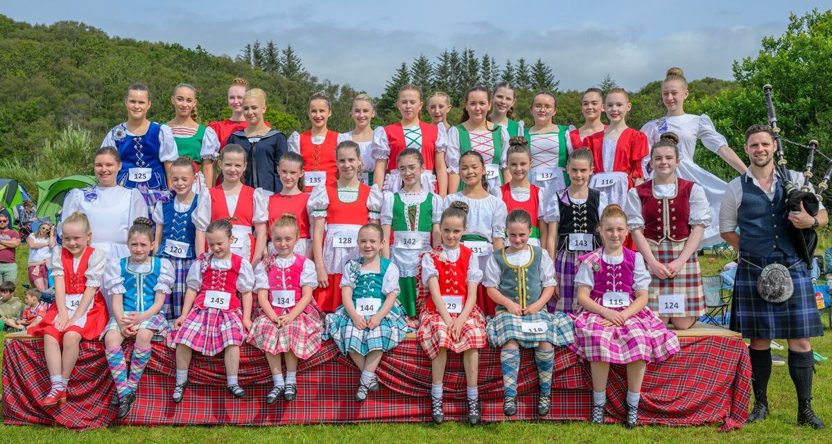 Highland dancers line up for a group photo before the competition begins. Photograph: Phil Hughes.