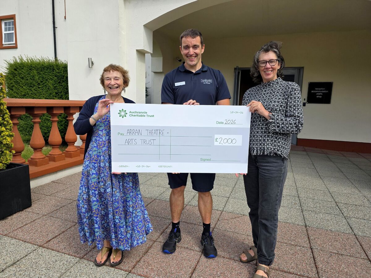 ACT trustee Glen Sloss presents Arran Theatre and Arts Trust director Heather Gough and chair Kirsteen Holuj with a cheque. Photograph: ACT. ACT trustee Glen Sloss presents Arran Theatre and Arts Trust director Heather Gough and chair Kirsteen Holuj with a cheque. Photograph: ACT.