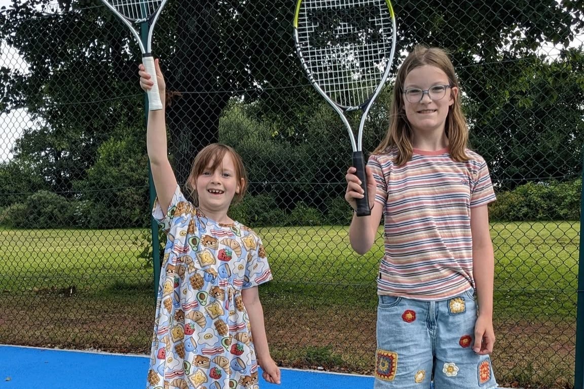 Two young girls were delighted to win the game of ‘bump’ at their camp. Photograph: Brodick Tennis Club. Two young girls were delighted to win the game of ‘bump’ at their camp. Photograph: Brodick Tennis Club.
