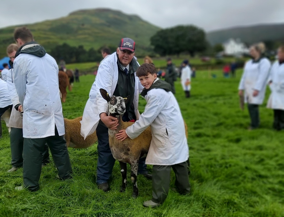 Matthew and Tod McNeish with their champion blueface Leicester. Photograph: Rona Fulton. Matthew and Tod McNeish with their champion blueface Leicester. Photograph: Rona Fulton.