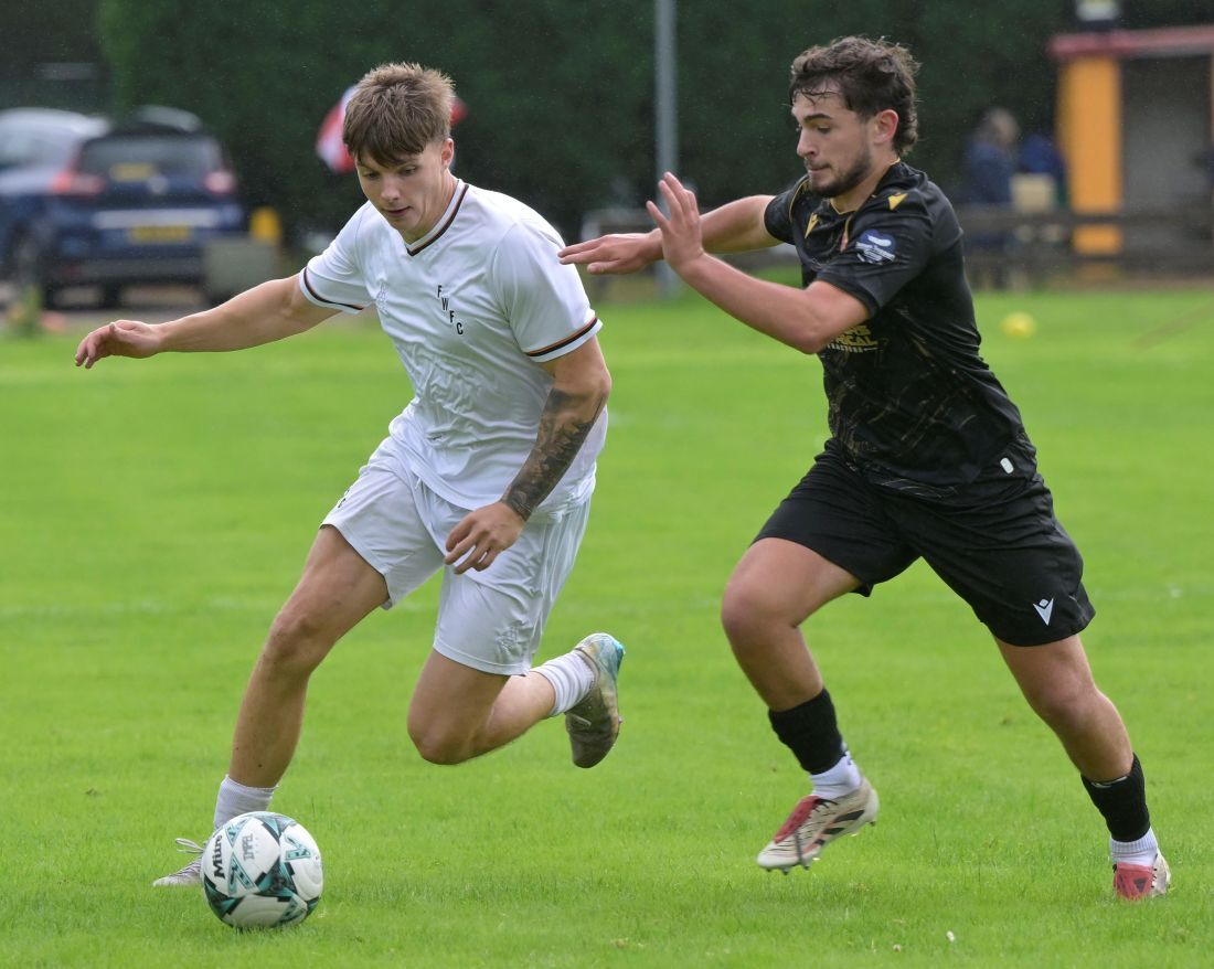 Fort's top goal scorer of last season, Liam Martin, makes a strong challenge. Photograph: Iain Ferguson, alba.photos.