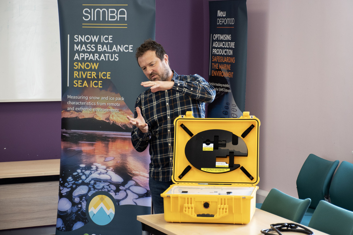 no t34 Dr Mark Hart with a SIMBA device which measure snow and ice melt rates for use in Arctic research projects and for helping to monitor environmental changes like changes in avalanche risk and th