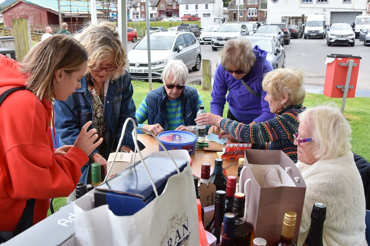 Volunteers, many of whom have volunteered for decades, did a roaring trade by selling raffle tickets for over two hour non-stop. Volunteers, many of whom have volunteered for decades, did a roaring trade by selling raffle tickets for over two hour non-stop.