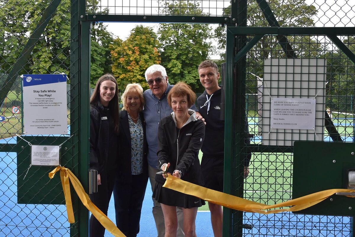 Maggie Carson cuts the ribbon to officially open the facility with Eleanor O’Donnell, racquet sports coordinator at KA Leisure, Rhona Alston, president of Tennis Scotland, Charles Currie, Arran councillor and Ross Dobson, Active Schools coordinator.