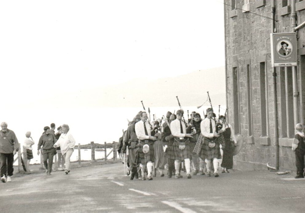 Arran Pipe Band led the procession of Viking boat burners past Corrie Hotel on their way to Sannox beach where the traditional boat burning ceremony marks the end of the Corrie Capers festival. Arran Pipe Band led the procession of Viking boat burners past Corrie Hotel on their way to Sannox beach where the traditional boat burning ceremony marks the end of the Corrie Capers festival.