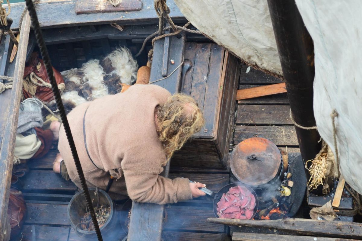 Cooking aboard Brioc, where the crew aimed to recreate aspects of 10th-century life at sea. Photograph: Kyle Gosling.