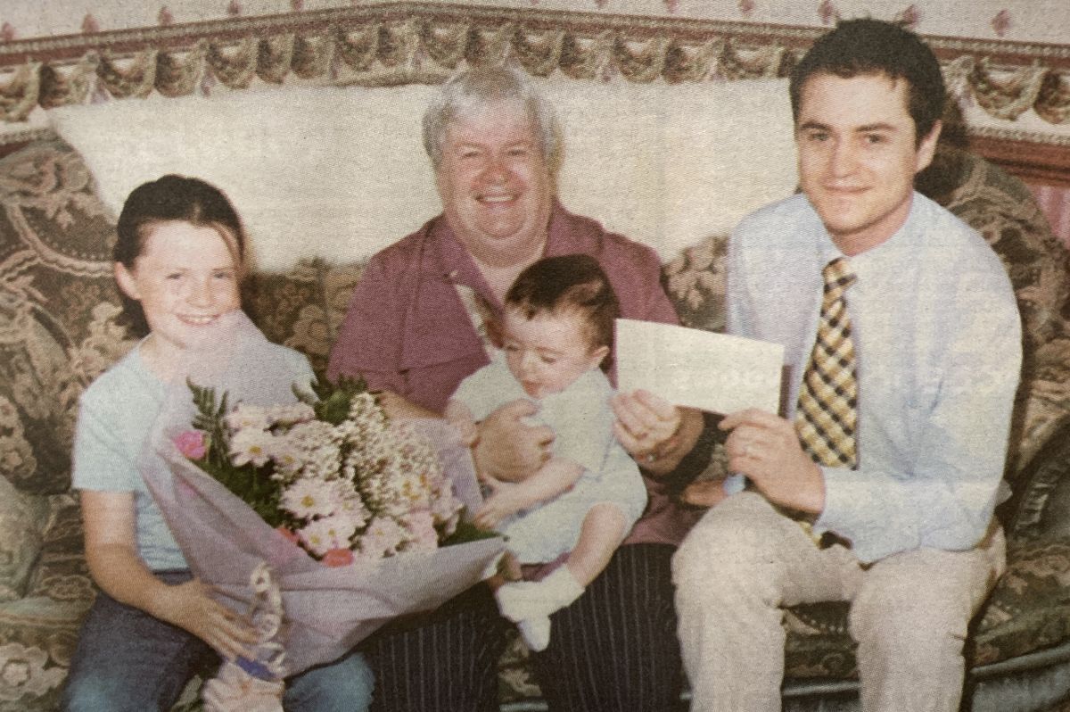 2001: Jean McGeachy along with her granddaughter Gayle and grandson Ryan receiving the cheque from the Courier’s Will Anderson.
