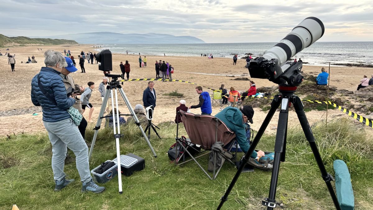 Club telescopes were set up at Westport Beach to give visitors a safe view of the eclipse when cloud allowed. Photograph: Keith Wilson. Club telescopes were set up at Westport Beach to give visitors a safe view of the eclipse when cloud allowed. Photograph: Keith Wilson.