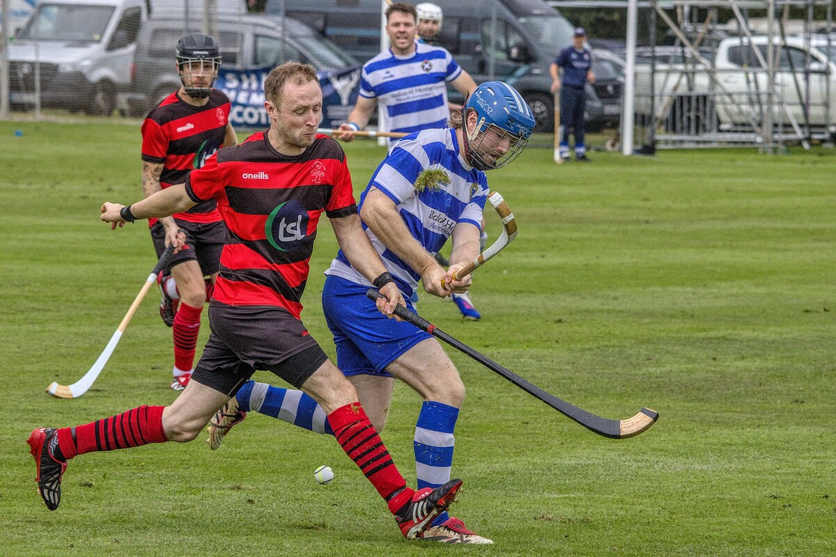no si t34 Lorne Dickie of Oban Camanachd clashes with Daniel Sloss of Newtonmore no si t34 Lorne Dickie of Oban Camanachd clashes with Daniel Sloss of Newtonmore
