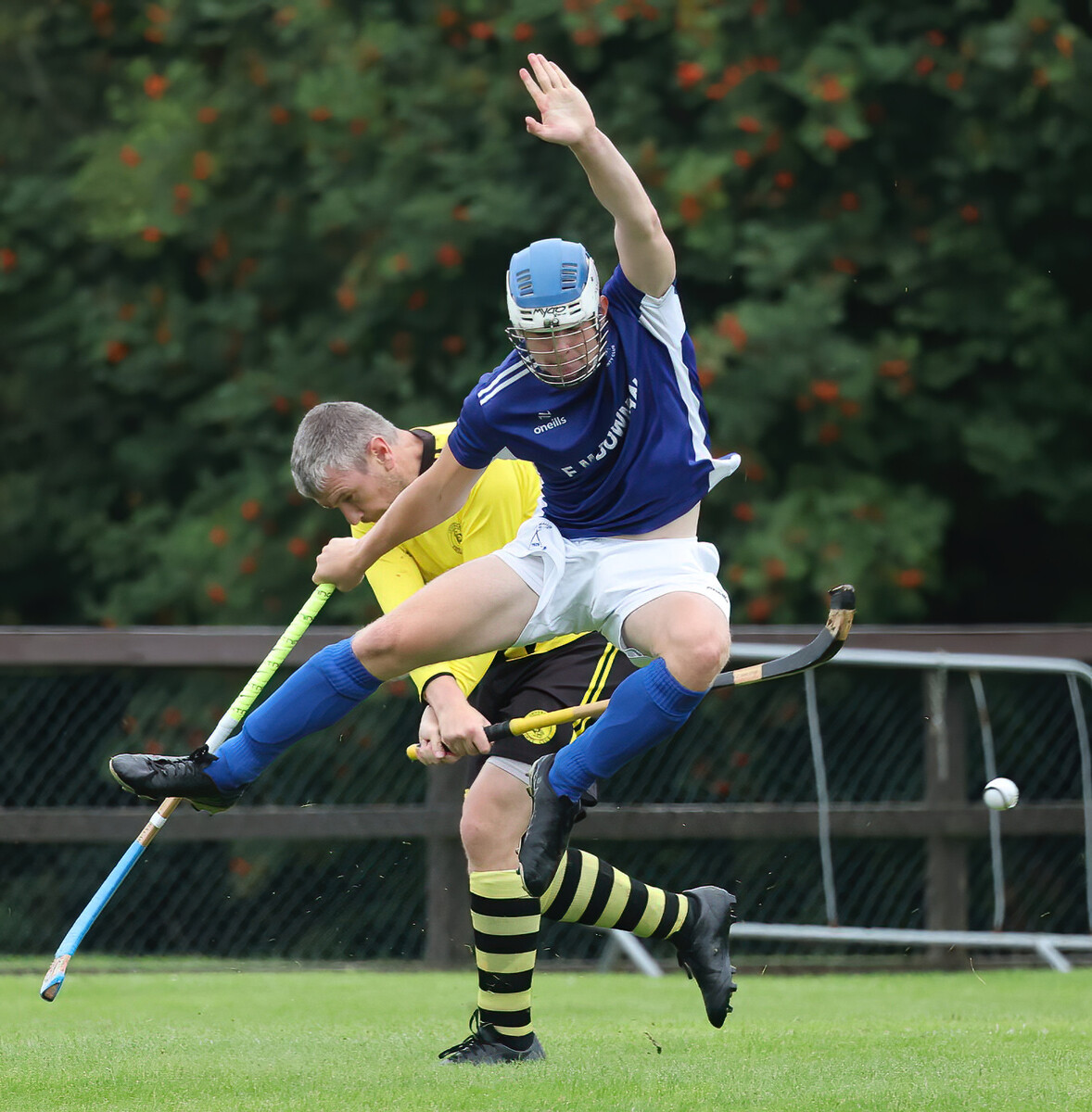 no sl t34 Shane ORua (Kilmallie) leaps high over the stick of Alan MacDonald (Inveraray) no sl t34 Shane ORua (Kilmallie) leaps high over the stick of Alan MacDonald (Inveraray)