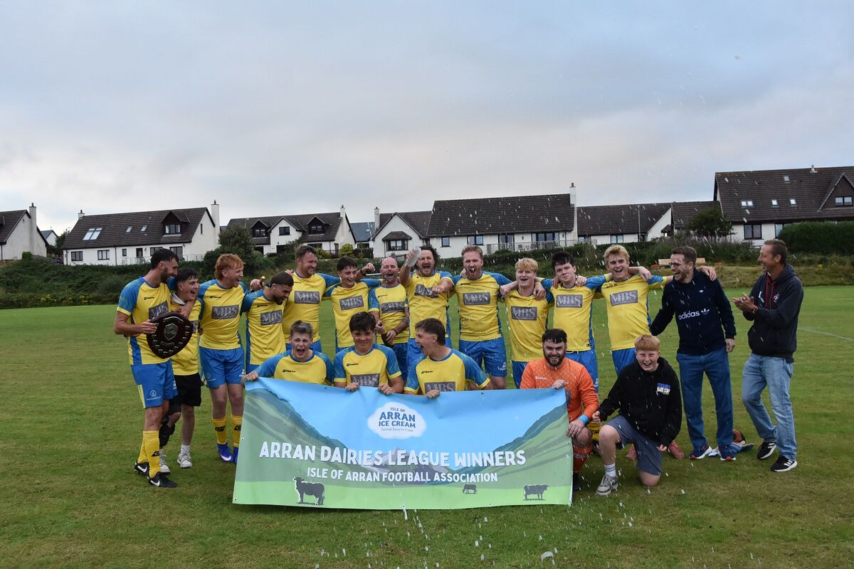 Delighted Southend players celebrate with the Arran Dairies Trophy.