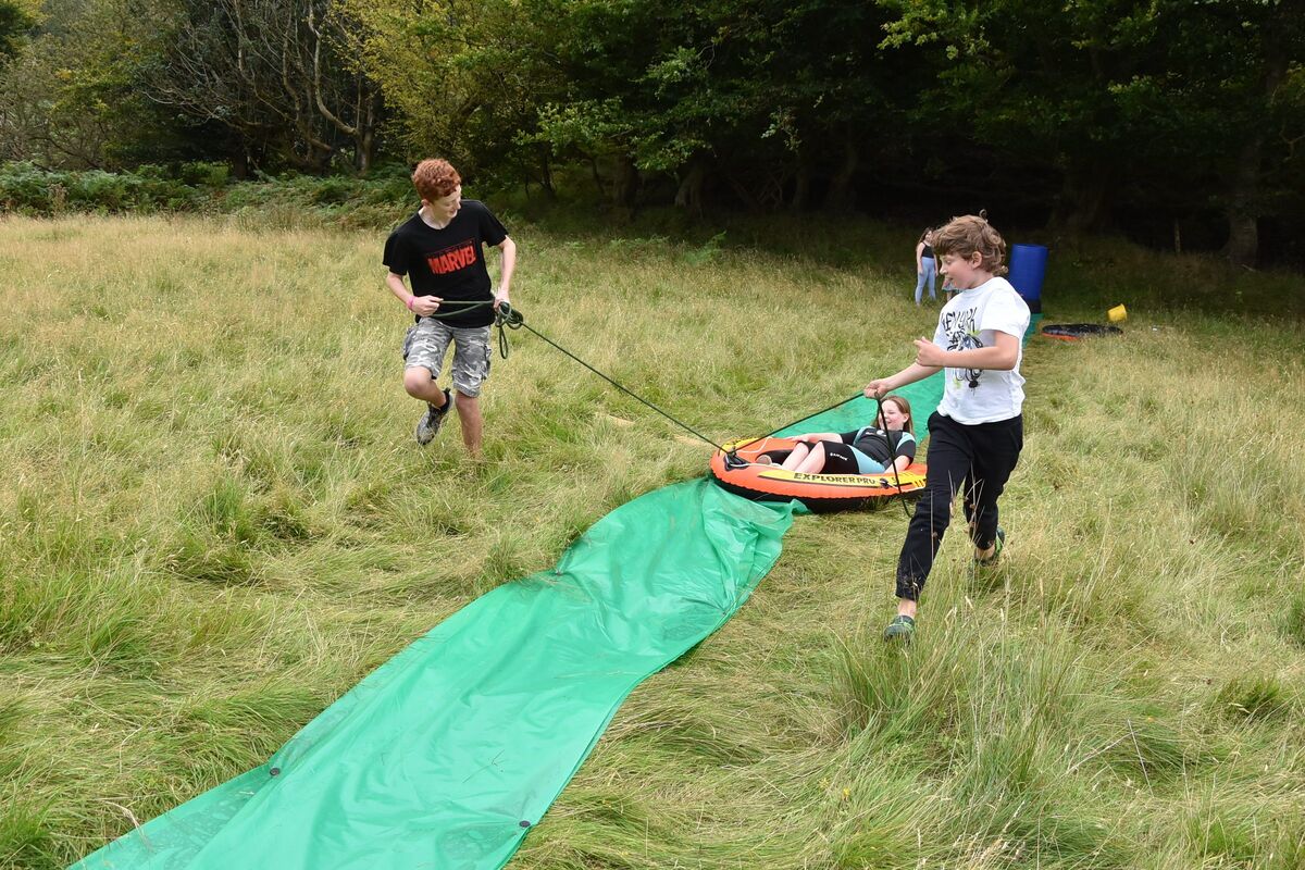 Children enjoyed the slip-and-slide which was located behind the centre. Children enjoyed the slip-and-slide which was located behind the centre.