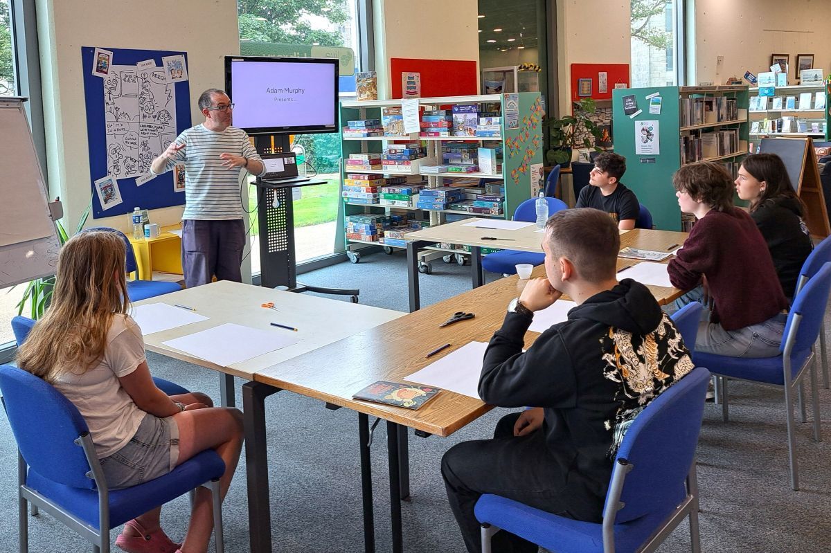 Author and illustrator Adam Murphy leads the graphic novel workshop for young people at Campbeltown Library. Author and illustrator Adam Murphy leads the graphic novel workshop for young people at Campbeltown Library.