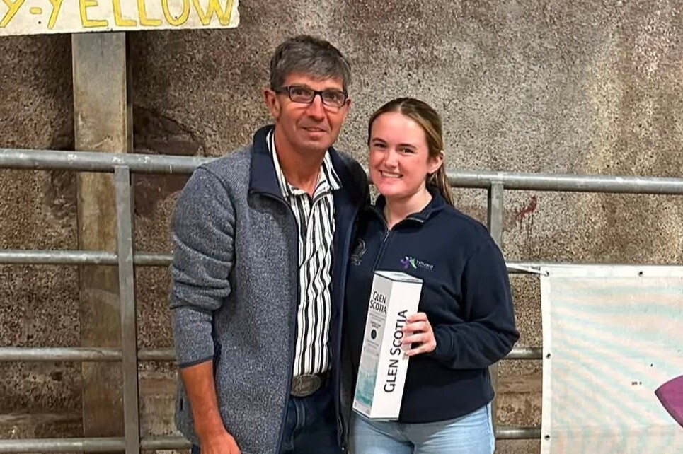 Stockjudging judge Jim Semple receives a token of appreciation from Campbeltown Young Farmers secretary Heather Millar. Stockjudging judge Jim Semple receives a token of appreciation from Campbeltown Young Farmers secretary Heather Millar.