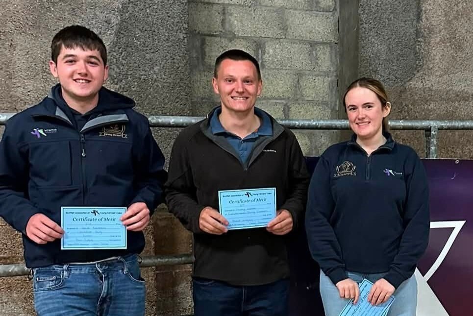 Young Farmers runners up Jack Ralston, left, and Harry Gemmill with Heather Millar.