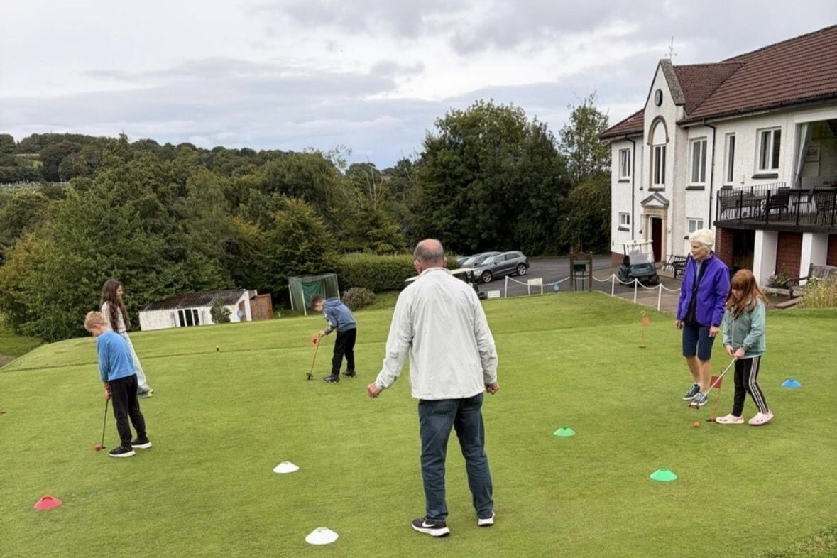 Young golfers practice their putting during one of the training sessions at Lamlash Golf Club. Photograph: LGC. Young golfers practice their putting during one of the training sessions at Lamlash Golf Club. Photograph: LGC.