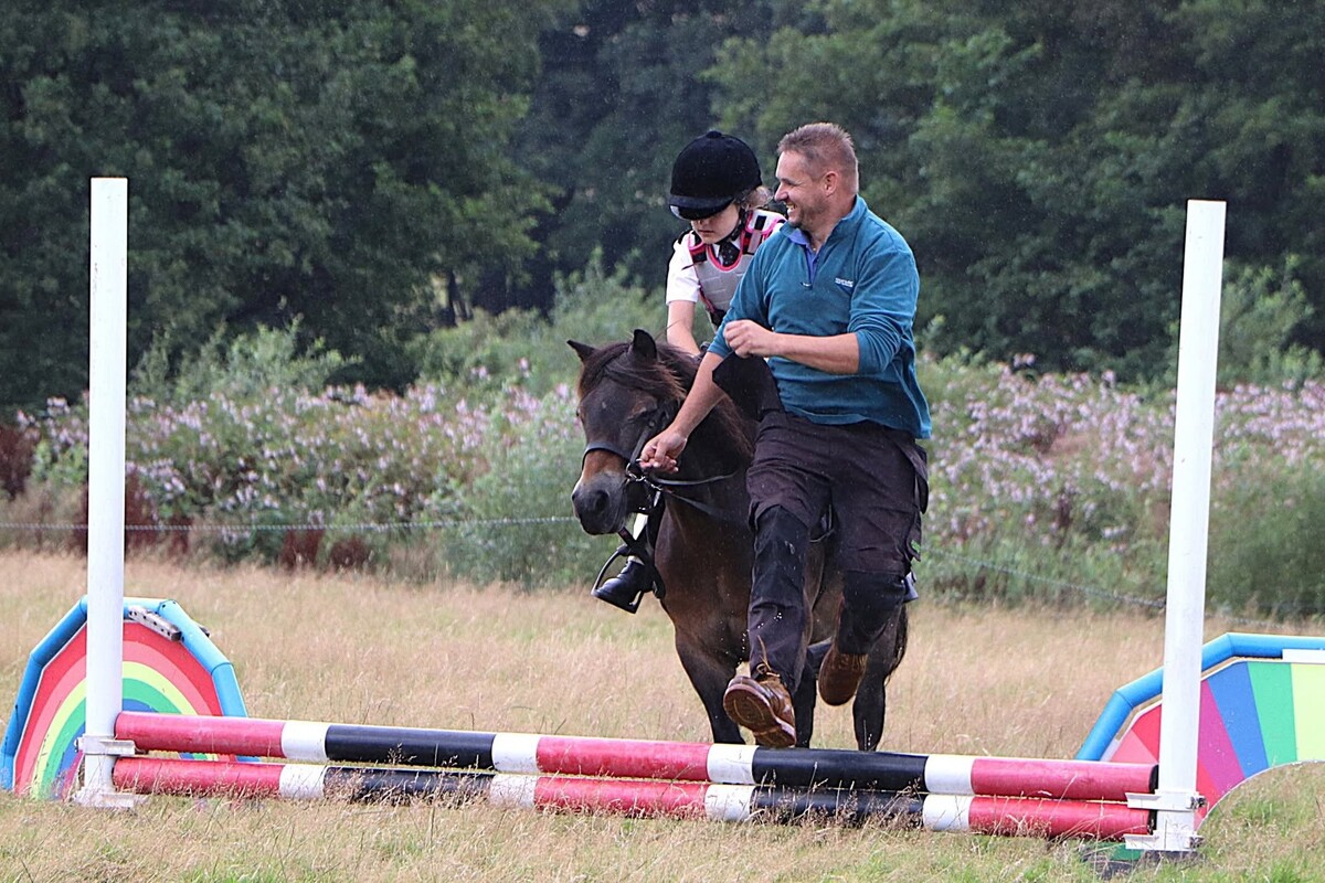 Maisie Picken and Milo won the showjumping phase in the 30cm class. Photograph: David Henderson.