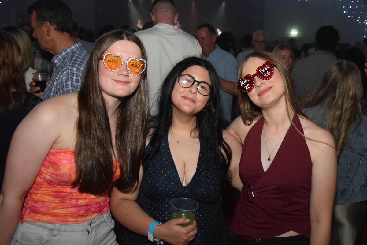 Lucy McFadzean, Daania Ahmad and Grace Barr in the festival spirit at Saturday night’s West Coast Rocks gig. 