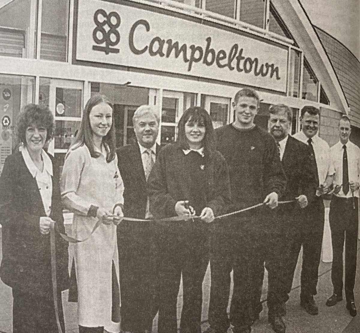 2001: Campbeltown Grammar School head girl Rhona Barr is pictured cutting the ribbon to mark the reopening of the town’s Co-op supermarket after its recent refurbishment, as head boy Ranald Rixson, the school’s assistant rector Alan Dunsire & Co-op staff.