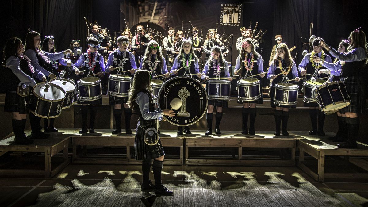Kintyre Schools Pipe Band’s members got into the festival spirit for their Survivors Night performance. Photograph: John Coffield. Kintyre Schools Pipe Band’s members got into the festival spirit for their Survivors Night performance. Photograph: John Coffield.