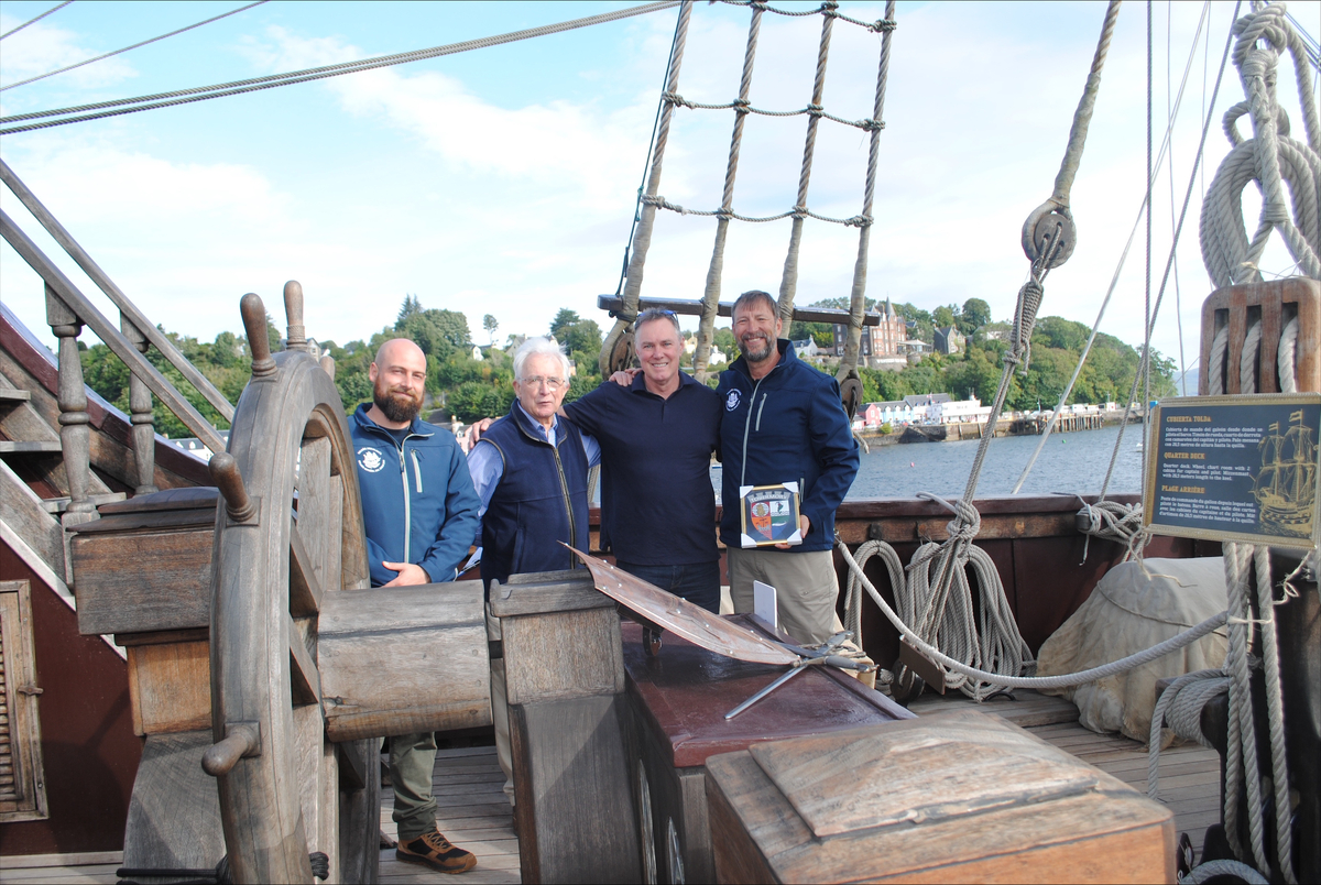 no t36 THA former chair Brian Swinbanks MBE and current chair John MacDonald handing over Tobermory coat of arms to the crew no t36 THA former chair Brian Swinbanks MBE and current chair John MacDonald handing over Tobermory coat of arms to the crew