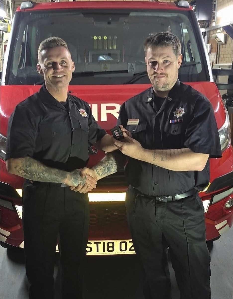 no t36 andrew noble recieves badge from james campbel